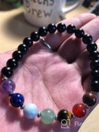 img 1 attached to Cherry Tree Collection Chakra Stretch Bracelet: Genuine 8mm Gemstones, Sterling Silver Spacers. Perfect for Men/Women. Choose from Small, Medium, or Large Sizes! review by Darryl Montagna