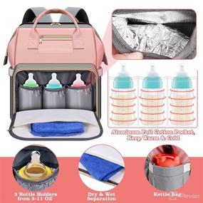 img 2 attached to 👶 RANSANX Diaper Bag Backpack with Changing Station - Large Baby Bag for Girls and Boys, Organizer Crib Included, Foldable Travel Backpack for Moms and Dads
