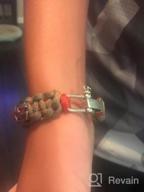 img 1 attached to High-Quality Kayder Hand Woven Paracord Bracelet: Embrace Retro Style with Adjustable D Shackle and Various Theme Accessories review by Kevin Carey