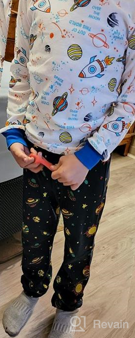 img 1 attached to Rocket Christmas Pajamas Set for Boys 🚀 and Girls - 4 Piece Sleepwear Pants Set review by Glenn Rodgers