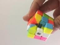 img 1 attached to Compact And Colorful 3X3 Rubik'S Cube Keychain For Speedcubing And Magic Shows - Stickerless And Fast Miniature Cube By CuberSpeed review by Tom Schuster