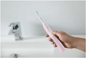 img 4 attached to 🎉 Enhanced Oral Care: Philips Sonicare ProtectiveClean 4300 HX6806/04 Sonic Toothbrush - Lovely Pale Pink Shade
