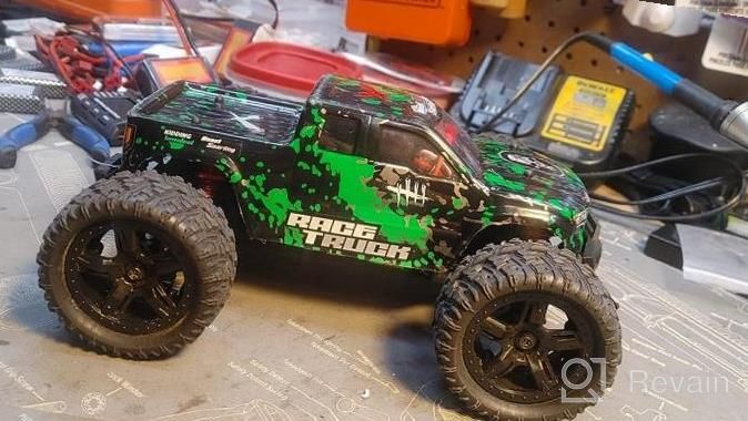 img 1 attached to HAIBOXING 1:18 4WD RC Car - 36 KPH High Speed, Waterproof Off-Road Truck W/ 2 Batteries & 2.4 GHz Remote Control review by Russell Galbreath
