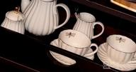 img 1 attached to 17-Piece Jusalpha Porcelain Tea Set - 8 OZ White Coffee Cup/Teacup, Saucer, Spoons, Teapot & Creamer (FD-TW17PC SET) review by Craig Sethuraman