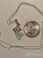 img 1 attached to ❄️ Disney Frozen Silver Plated Blue Snowflake Pendant Necklace with 18-Inch Chain review by Geoff Yates