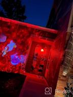 img 1 attached to Transform Your Home Into A Winter Wonderland: Halloween Christmas Projector Lights With Remote Control And 12 Festive Slides In 10 Colors review by Ron Chang