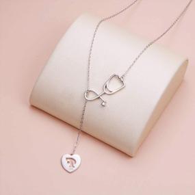img 2 attached to 925 Sterling Silver Alphabet Initial Letter Heart Lariat Necklace For Women Doctor Nurse Jewelry