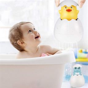 img 1 attached to 🦖 Bath Toy Set of 2 Baby Egg Raining Bath Toy | Hidden Dinosaur Squirt Egg Water Shower Tub Floating Toy | Plastic Easter Eggs for Boys and Girls | Bath Toys for 1-6 Years Old | Black