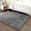 stylish and soft ophanie washable grey shaggy rug for modern home - perfect for bedroom, living room, and nursery décor logo