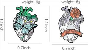 img 1 attached to 1 Set Of Aesthetic Anatomic Heart, Rose In Hand, Butterfly & Daisy Enamel Pins - Jewelry Gift For Lovers & Friends!