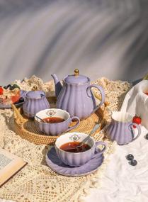 img 1 attached to Amazingware Porcelain Tea Set - Tea Cup And Saucer Set Service For 6, With 28 Oz Teapot Sugar Bowl Cream Pitcher Teaspoons And Tea Strainer - For Thanksgiving - Pumpkin Fluted Shape, Purple