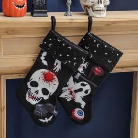 img 1 attached to Set Of 2 Halloween Stockings With Skull, Ghost, And Bloody Eyeball Print - Perfect For Fireplace Decoration, Candy Gifts, Or Hanging Display (18.5 Inches)