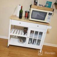 img 1 attached to ChooChoo Rolling Kitchen Island: Portable, Drawer & Glass Cabinet, Wine Shelf, Towel Rack, White review by Alex Maynard