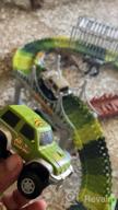 img 1 attached to 159 Pcs Dinosaur Glow In The Dark Race Train Track Toy For Boys & Girls Ages 3-7 | DinoManiacs By JitteryGit review by Jamal Yang