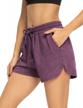 comfortable and stylish thanth women's 3" yoga shorts with elastic waist and pockets for workout and lounge logo
