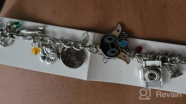 img 1 attached to 🌟 Stitch Charm Bracelet: Perfect Gifts for Anime-loving Women and Girls, Explore the Universe of Fandoms review by Jasmine Leon