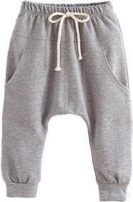 img 4 attached to Versatile Unisex Harem Pants for Kids with Elastic Waist, Cotton Blend, and Convenient Pockets