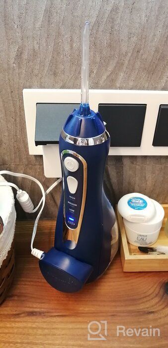 img 1 attached to Waterpik Blue WP-563 Cordless Advanced Water Flosser with Travel Bag and 4 Tips - Rechargeable, Portable, Waterproof, and ADA Accepted for Teeth, Gums, Braces, and Dental Care review by Anand ᠌