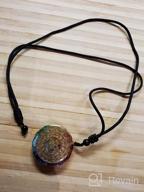 img 1 attached to Experience Chakra Healing Energy with 🧘 Our Luminous Orgonite Pendant Om Symbol Necklace review by Emanuel Frison