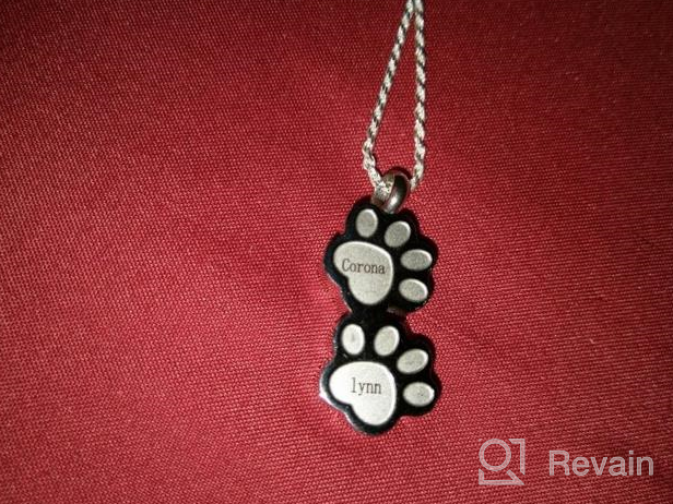 img 1 attached to Double Paw Print Urn Pendant – 🐾 Stainless Steel Cremation Jewelry for Ashes, Memorial Keepsake review by Gregory Castellanos