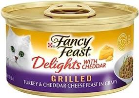 img 2 attached to 🍽️ Fancy Feast Purina Delights с Чеддером: Жареный индейка и чеддер в соусе (12 упаковок, банки по 3 унции) - изысканный гурманский угощение для кошек