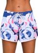 chic floral women's board shorts with pockets for beach and swim activities logo