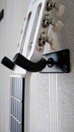 img 2 attached to Wall mounted guitar holder review by Mateusz Wysokiski ᠌