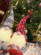 img 1 attached to GMOEGEFT Scandinavian Christmas Gnome Lights With Timer, Swedish Santa Tomte Gnome With Dangling Legs, Set Of 2 Nordic Xmas Decoration - 27 X 4.8 Inch (Snowflake Pattern) review by John Young