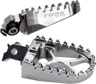 tusk billet race foot pegs with springs for kawasaki klr650 (1987-2018, 2022) - optimize your search логотип