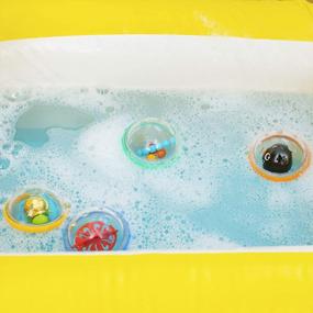 img 1 attached to Munchkin Sit And Soak Baby Bath Tub With 4Pk Float And Play Bubbles Bath Toy