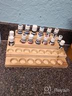 img 1 attached to Organize And Display Your Essential Oils With LIANTRAL'S 3-Tier Rack In Rustic Burnt Wood Design review by Brando Carpenter