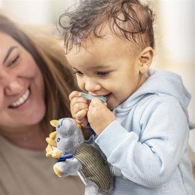 img 2 attached to 🦖 Baby Lovey Pacifier Holder & Teether Clip - Dr. Brown's Soft Plush Stuffed Animal Triceratops Pacifier Tether with Teal HappyPaci, 0-12m - 100% Silicone