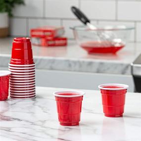 img 1 attached to 🍾 [100 Count - 2 oz.] Red Mini Plastic Shot Glasses - Disposable Jello Shot Cups