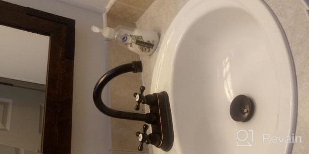 img 1 attached to Upgrade Your Bathroom With UFaucet'S Elegant Black 2-Handle Centerset Sink Faucet: Easy To Install And Made With Stainless Steel review by Scott Decoteau