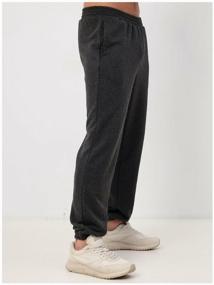 img 4 attached to Sports trousers for men with an elastic band MOM No. 1