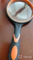 img 1 attached to 8X Handheld Reading Magnifying Glass For Kids And Seniors - MJIYA Non-Scratch Quality Glass Lens And Shatterproof Design (75Mm, Orange) review by Joy Bell