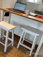 картинка 1 прикреплена к отзыву Amazon Basics Solid Wood Saddle-Seat Kitchen Counter Barstool - Set Of 2, 29-Inch Height, White от Edy Yukface