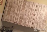 img 1 attached to RoomMates RMK12006WP Gray Weathered Planks Peel And Stick Wallpaper review by Yung Kitamura