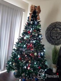 img 7 attached to Искусственная рождественская елка OurWarm 7FT, рождественская елка со снегом и сосновыми шишками, рождественская сосна для внутренних и наружных праздничных украшений со складной металлической подставкой, 1400 наконечников для веток