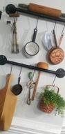 картинка 1 прикреплена к отзыву Black Wall Mounted Pot Rack With 16 Hooks And Detachable Organizer For Pans, Lids, And Utensils - Toplife 39.4 Inches от Ryan Bowers