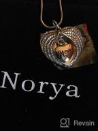 img 1 attached to Norya God embraces you with sparkling Angel Wing Diamond Cremation Jewelry Keepsake Memorial Urn Necklace review by Anthony Rael