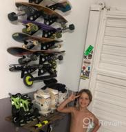img 1 attached to StoreYourBoard Trifecta Wall Rack, Multi-Purpose Home Storage Mount And Gear Holder review by Bubba Baldwin
