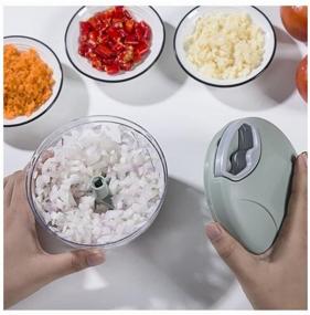 img 2 attached to Multifunctional mechanical chopper, manual vegetable cutter, blender, slicer for onions, grater for garlic, vegetables, fruits, berries, 500ml.