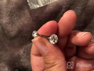 картинка 1 прикреплена к отзыву Sparkle And Shine With GAGABODY'S G23 Titanium Belly Button Piercing Ring- 14G, 3/8 Inch With Double Prong-Set Gems! от Paula Whalen