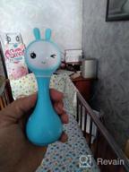 img 1 attached to 🎶 Blue Alilo Smarty Bunny Shake & Tell Musical Toy Rattle for Newborns and Infants - Soother with Lullaby Song Story, Music Player & Games review by Agata wistowska ᠌