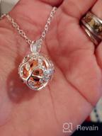 img 1 attached to Hypoallergenic Sterling Silver Urn Necklace with Cubic Zirconia for Ashes review by Chris Mania