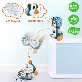img 1 attached to Музыкальная светящаяся игрушка Moontoy Penguin Baby для обучения и игр - идеальный подарок для младенцев и малышей в возрасте от 6 до 24 месяцев