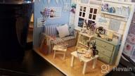 img 1 attached to Create Your Own Miniature Kitten Diary Room: TuKIIE DIY Dollhouse Kit With Furniture And Accessories In 1:24 Scale review by Michelle Anderson