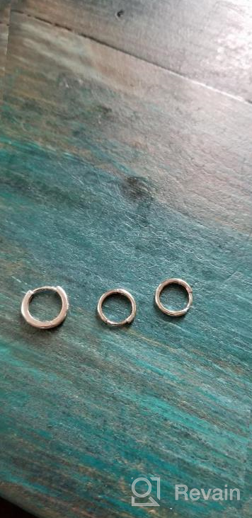 img 1 attached to Rhodium Plated 2mm x 13mm Plain Small Hoop Huggie Earrings in 925 Sterling Silver review by Melissa Marie