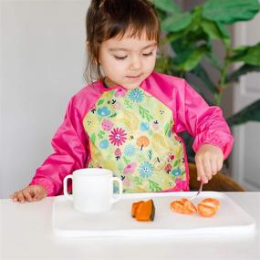 img 1 attached to green sprouts Easy-Wear Long Sleeve Bib: Waterproof Protection with Flipped Pocket - Soft Material, Easy to Clean Smock